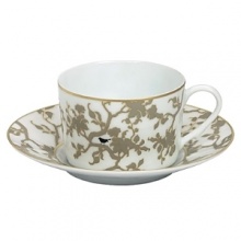 This Limoges porcelain dinner service was created by the well-known designer Sylvie Langet for Raynaud. The leaf design and the bird silhouettes are reminiscent of the golden era of past styles. The fresh colors evoke a feeling of hospitality and the lightness of an early summer day. The clever interplay of positive and negative color highlights the design very effectively. The birds decorate the individual pieces of the dinner service in black, white or gold - to match the rims. This Limoges porcelain dinner service was created by the well-known designer Sylvie Langet for Raynaud. The leaf design and the bird silhouettes are reminiscent of the golden era of past styles. The fresh colors evoke a feeling of hospitality and the lightness of an early summer day. The clever interplay of positive and negative color highlights the design very effectively. The birds decorate the individual pieces of the dinner service in black, white or gold - to match the rims.