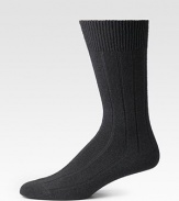 A dressed-up look with generous cashmere softness and plenty of stay-put stretch. Mid-calf height Wool/viscose/cashmere/polyamide; machine wash Imported