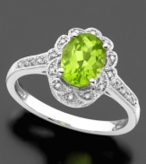 Filled with royal beauty, this 14k white gold ring features oval-cut peridot (1-1/3 ct. t.w.) and diamond accents.