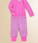 Keep baby snug in a soft knit with bottom snaps for easy on and off.Envelope neckline for comfort and easeLong sleevesSnap bottom50% cotton/50% modalMachine washImported Please note: Number of snaps may vary depending on size ordered. 