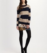 Bold stripes add a sporty touch to this featherweight silhouette of wool and cashmere.Crewneck Dropped shoulders Pullover style About 24 from shoulder to hem 70% wool/30% cashmere Dry clean Imported