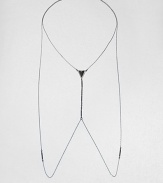 A simple Y-shaped body chain creates drama with its long drape with accents of black onyx and vintage black glass bugle beads.Black onyxBlack glassHematite-plated brassGunmetal colorLength around neck, about 24Lobster claspMade in USA