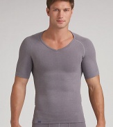 An essential underlayer or workout separate with an exclusive design that builds in physiotherapy taping techniques to gently pull the shoulders back and promote optimal alignment. Seamless stitching and targeted mesh provides a breathable, second skin fit. Micro polyester/nylon/spandex; machine wash Imported