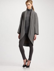 This opulent double-face virgin wool blend features a cocoon-shape with oversize suede belt to cinch the look.Open front Slash pockets Tulip hem About 40 from shoulder to hem 95% virgin wool/5% polyester Dry clean Made in ItalyOUR FIT MODEL RECOMMENDS ordering true size. This opulent double-face virgin wool blend features a cocoon-shape with oversize suede belt to cinch the look.Open front Slash pockets Tulip hem About 40 from shoulder to hem 95% virgin wool/5% polyester Dry clean Made in ItalyOUR FIT MODEL RECOMMENDS ordering true size.