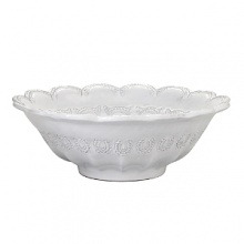 A must-have, handmade statement piece from the Incanto collection, this scalloped edge bowl is perfect for serving pasta or salad at a dinner party, or as a decorative piece for the table. A must-have, handmade statement piece from the Incanto collection, this scalloped edge bowl is perfect for serving pasta or salad at a dinner party, or as a decorative piece for the table.