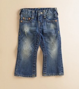 Darling denim for the little one, this distressed pair with a faded rinse is a fun take on the blues. Belt loops Front zipper with snap closure Five-pocket styling Back flap snap pockets Small Buddha pocket lining Cotton; machine wash Imported of American fabric Please note: distress pattern may vary