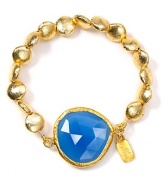 Coralia Leets' chalcedony stretch bracelet is a versatile eye-catcher. Set the vibrant gemstone against crisp white cotton for contemporary chic.