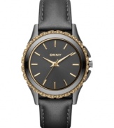 Dusky tones on rich leather blend with sparkling golden accents on this DKNY watch.