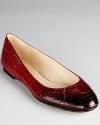 In deep ruby hued snakeskin, these ombre KORS Michael Kors flats are a luxe take on the jewel tone trend.