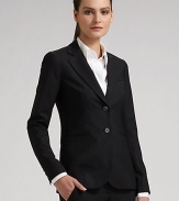 Impeccably tailored stretch wool for an easy, elegant fit.  Double button front with notch collar  One chest and two welt pockets  Buttoned cuffs  Back vent  Fully lined  Wool/Lycra  Dry clean  Made in USA