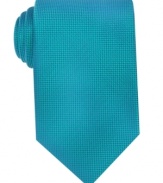A subtle pattern on this Geoffrey Beene silk tie provides just the right amount of pop in the office.