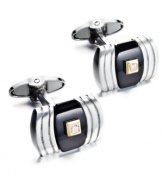 A little bit of everything. These sophisticated cuff links feature a rounded rectangular shape with a round-cut diamond center (1/2 ct. t.w.), onyx backdrop (10-3/4 ct. t.w.) and sterling silver setting with 14k gold accents. Approximate length: 3/4 inch. Approximate width: 7/16 inch.