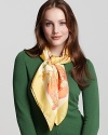 A ladylike sun and floral print scarf with a springtime feel. By Salvatore Ferragamo.