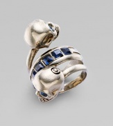 A simple ring with princess stones is punctuated with twin skulls, for a punk-rock twist.Crystal Brass Diameter, ¾ Width, ½ Made in Italy