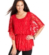 Floral lace and flutter sleeves are just two of the reasons Style&co.'s smocked lace top looks extra feminine.