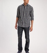 Gently worn-in Italian denim ideal for dressed-up or down style with straight legs and a dark wash. Five-pocket style Inseam, about 34 Cotton; machine wash Imported 
