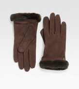 Keep your fingers toasty with this luxurious shearling-trimmed style. Dyed sheepskin shearlingSuedeCashmere linedAbout 9½ longSpecialist dry cleanImportedFur origin: Spain
