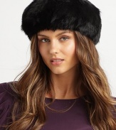 A brimless style in a dyed animal print. Dry clean Imported Fur origin: Spain