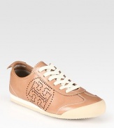 Unique perforations form a signature logo on the side of this lace-up leather essential. Leather upperLeather liningRubber solePadded insoleImportedOUR FIT MODEL RECOMMENDS ordering true size. 