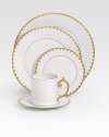 A stunning saucer in fine Limoges porcelain, made entirely by hand and finished with individually-applied 14k gold filet border. From the Aegean Filet Collection Porcelain 6½ diam. Dishwasher safe Imported 