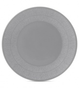 Effortlessly chic, the Simplicity dinner plate by Vera Wang Wedgwood features a minimalist shape in casual porcelain lined with neutral cream and gray.