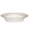 Dress up any veggies or sides with this fine china serving dish. From innovative designer Monique Lhullier's collection of dinnerware and dishes, it features a pearlescent border with glossy raised dots and a fine stitch-like pattern.