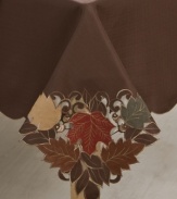 Featuring elaborate cutwork, embroidered accents and leaves piled in rich fall colors, the Maple Quartet table runner sets the scene for an unforgettable autumn, year after year. (Clearance)