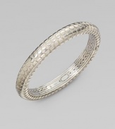 From the Dot Collection. This geometric design features an inner, dotted texture in sleek sterling silver and radiant 18k gold?? Sterling silver18K gold???Diameter, about 2.5Hinged, push clasp closureImported 