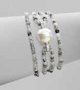 EXCLUSIVELY AT SAKS.COM. A glistening baroque pearl, surrounded by strands of organic beads, is accented by sparkling cubic zirconia. 14mm baroque pearl Cubic zirconia Sterling silver Length, about 7½ Lobster clasp Made in Spain 