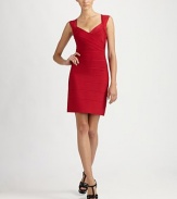 A body-hugging stretch knit, with graphic ribbing and a dramatic cutout back.Cap sleeves V neckline Diagonal ribbing across bodice Square cutout back Back zip closure About 20 from natural waist 90% rayon/9% nylon/1% spandex Dry clean ImportedModel shown is 5'9 (175cm) wearing US size Small. 