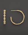 18K gold and diamond earrings from the Laurel collection. By Judith Ripka.