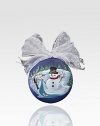 This season, bring Frosty inside with a charming painted glass ornament, complete with a whimsical, snowflake-patterned silver ribbon.12 diam. Imported 