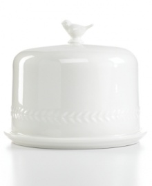 Whiteware gets whimsical. A figural bird and branches sculpted in fresh white porcelain make this Martha Stewart Collection cake dome a charmer on casual tables. Whiteware gets whimsical. A figural bird and branches sculpted in fresh white porcelain make this Martha Stewart Collection cake dome a charmer on casual tables.