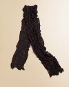 A classic tartan plaid gives a heritage look to a ruffled scarf, perfect for the holiday season.Multi-tiered layered rufflesRectangular shaped55 X 5CottonMachine washImported