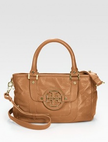 Classic pebble-grain leather in a roomy shoulder bag finished with chic logo hardware.Double top handles, 5¼ dropAdjustable removable shoulder strap, 19¼-21¾ dropTop zip closureTwo outside open pocketsProtective metal feetOne inside zip pocketTwo inside open pocketsCanvas lining11W X 7½H X 3¾DImported