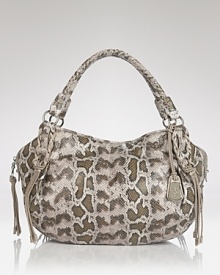 Cole Haan's signature satchel gets exotic in python-embossed leather. Pockets and over-the-shoulder ease make this style ideal for the woman with day-to-night demands. Cole Haan's signature satchel gets exotic in python-embossed leather. Pockets and over-the-shoulder ease make this style ideal for the woman with day-to-night demands.
