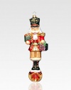 An exquisite ornament created by skilled artisans who capture all the traditional charm of a holiday nutcracker in a delicate, timeless glass design. Painted, glittered glass 7 high Made in Poland 