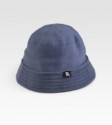 A soft cotton knit design with a bell silhouette and a ribbed brim. Hand wash Imported