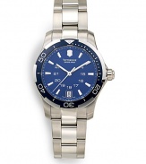 THE LOOKRound stainless steel case, 32.5mm (1.28)Precision Swiss quartz movementUnidirectional rotating bezelScrew-in case backScratch-resistant sapphire crystalBlue dialLuminous silver bar hour markers and handsDate window at 6:00Brushed and polished stainless steel link braceletPush-button foldover claspWater resistant to 10 ATMTHE MATERIALStainless steelORIGINMade in Switzerland