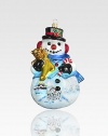 A top-hatted snowman adorned with charming Russian scenes has dazzling touches of glitter and gold atop his mouth-blown, hand-painted form.Glass6.25H X 3.5W X 3.5DImported