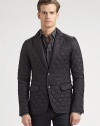 An all-weather update for a cornerstone of menswear style: the classic blazer in quilted nylon that offers a casual and sporty look for all climates. Two-button front Chest ticket pocket Waist flap pockets Suede elbow patches About 29 from shoulder to hem Polyamide Machine WashImported 