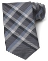 Burberry London preserves its heritage with a sophisticated signature check tie, crafted for a classic look that pairs well dressed up or down.