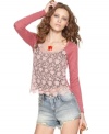 Floral lace gets a casual makeover in this cropped Free People top -- a hot spring layering piece!