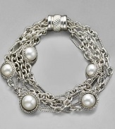Pearls from the deep are captured in a cabled settings tangled in a netting of sterling chains. Mixed link bracelet 7½ long Cable barrel clasp Imported