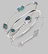 From the Wonderland Collection. Bright turquoise ovals with gleaming crushed bronze veining, layered with faceted clear quartz for added dimension.Bronze turquoise and clear quartz Sterling silver Diameter, about 2½ Imported