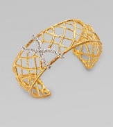A pretty crystal accented cuff with delicate branches of pavé Swarovski cystals. 18k goldplated brass Length, about 6½ adjustable Width, about 1 Imported 