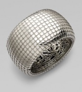 From the Dot Collection. This geometric design features a dotted texture in sleek sterling silver. Sterling silverDiameter, about 2¼Push clasp closureImported 