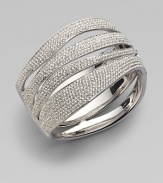 EXCLUSIVELY AT SAKS.COM. Curvaceous rows of pavé crystals decorate the wrist.Crystals Rhodium plated Width, about 1¾ Diameter, about 2½ Push lock closure Imported