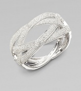 EXCLUSIVELY AT SAKS. A wide pattern of elegantly interwoven strands of pavé crystal creates a look of endless sparkle.Crystal Rhodium plated Diameter, about 2¼ Hinged with push-lock clasp Imported