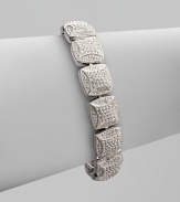 EXCLUSIVELY AT SAKS. This endless dazzle pf pavé crystal squares surrounds your wrist exquisitely.CrystalRhodium platedLength, about 7¼Push-lock claspImported